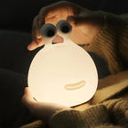 Luminera™ Snuggle Snail Night Light